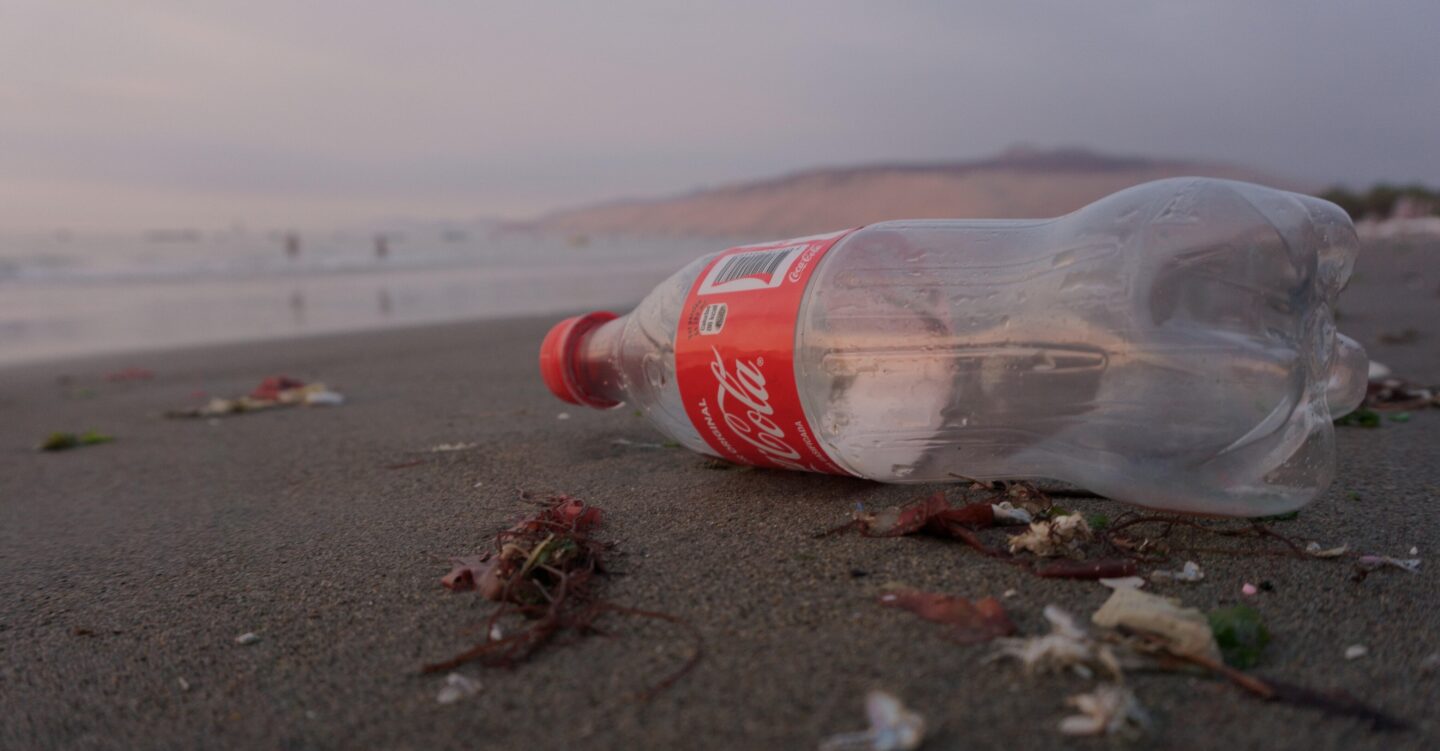 Plastic bottle litter on beach