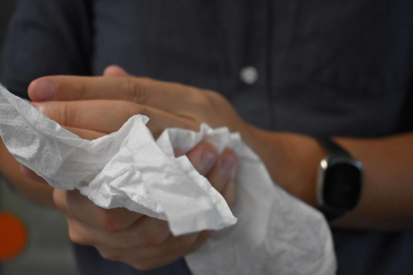 Drying hands with tork paper towel