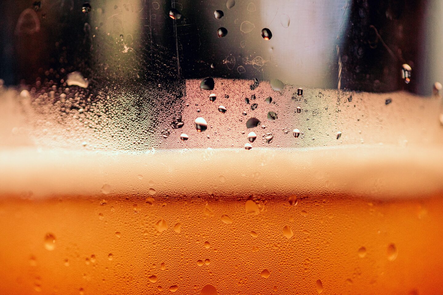 Close up of beer glass with bubbles